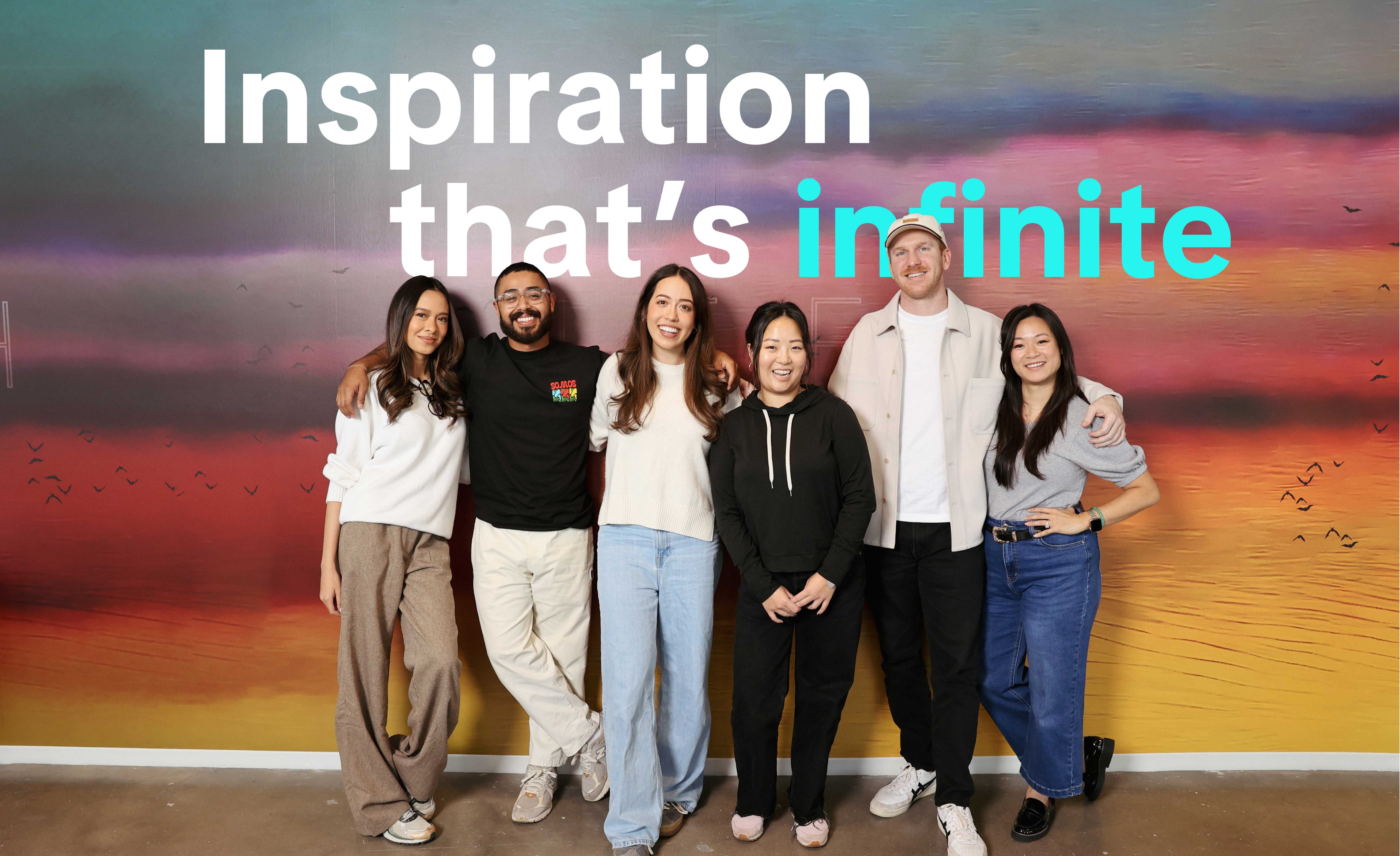TikTok employee pose in front of a colorful wall.